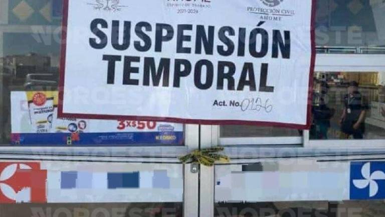 Autoridades colocaron sellos de suspensión en el comercio donde madre e hijo perdieron la vida por inhalación de gas tóxico.
