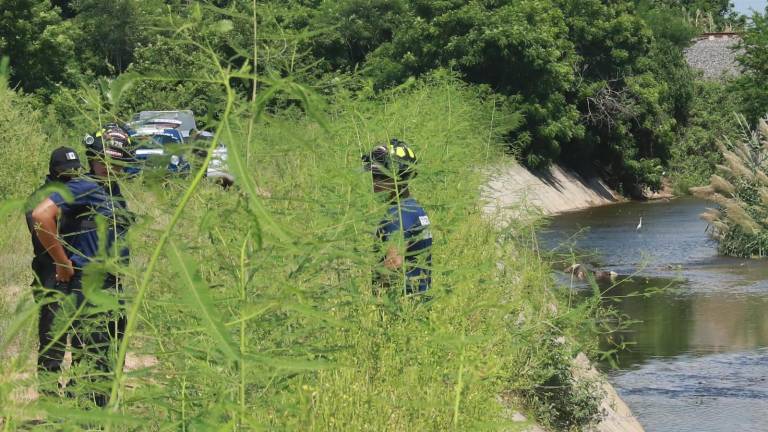 El cadáver fue descubierto desde una vivienda de un fraccionamiento que colinda con un canal que cruza la avenida Del Delfín.