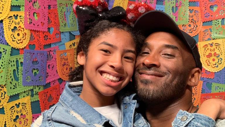 Kobe Bryant y a su hija Gigi.
