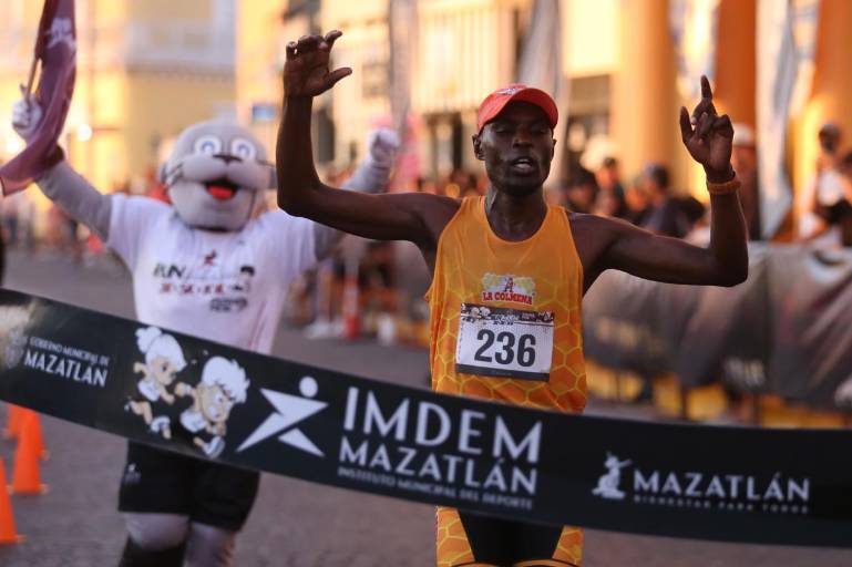 Geoffrey Kenisi y Anahí Rivera conquistan fiesta atlética de 11 aniversario de Imdem