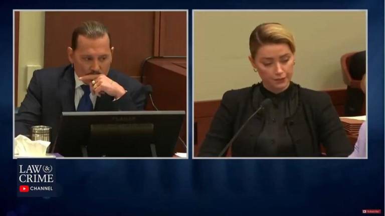 Johnny Depp y Amber Heard durante el juicio.