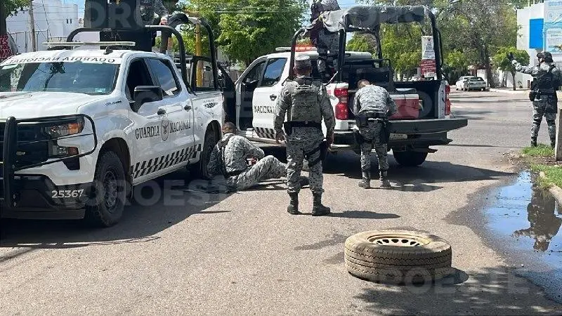 $!Ataque a la Guardia Nacional desata persecución en Culiacán; detienen a dos y aseguran una casa