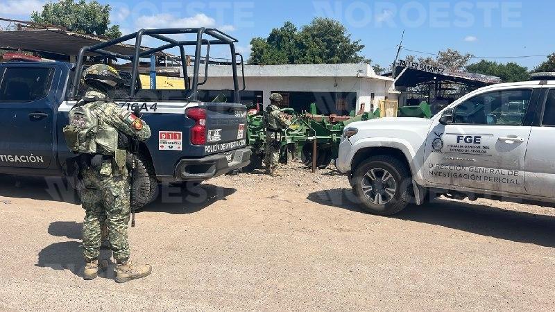 $!Hallan a dos hombres asesinados en taller de implementos agrícolas en Navolato