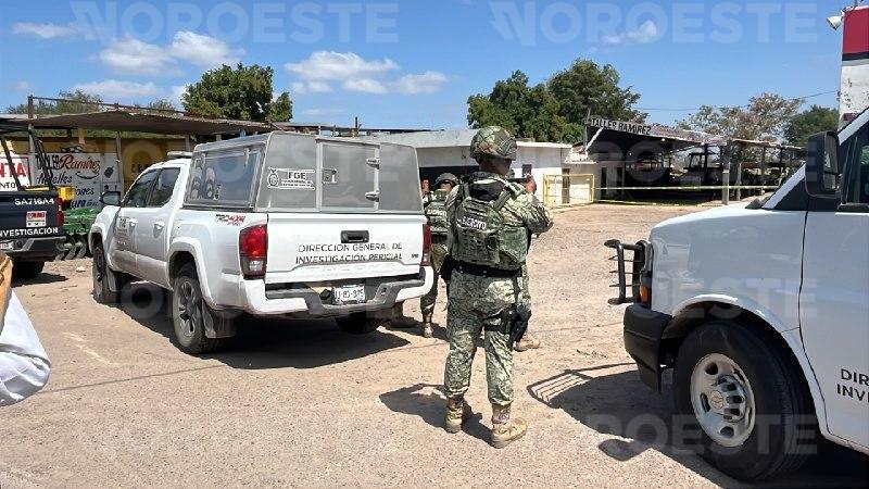 $!Hallan a dos hombres asesinados en taller de implementos agrícolas en Navolato