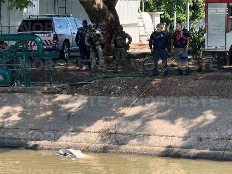$!Cae vehículo al canal San Lorenzo en Culiacán; un joven muere ahogado y otro es rescatado con vida