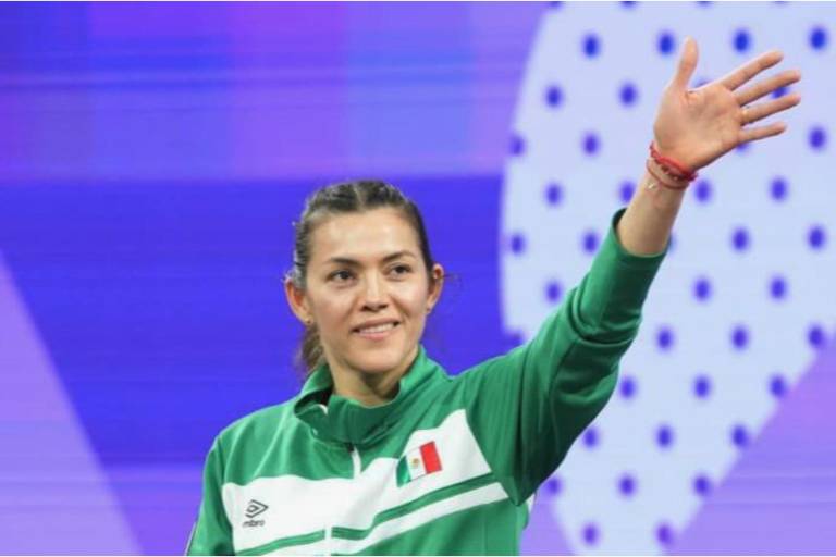 María Espinoza feliz por su primer reconocimiento como entrenadora de para taekwondo