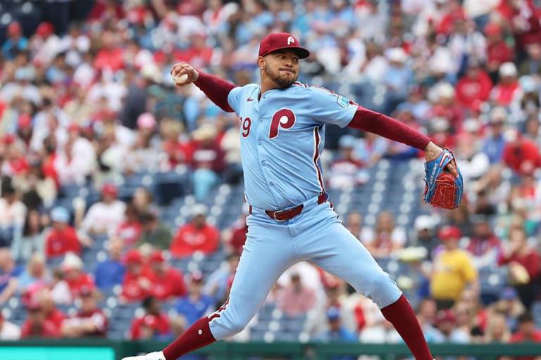 Filis barren a Rockies con un sólido Walker y jonrón de Schwarber