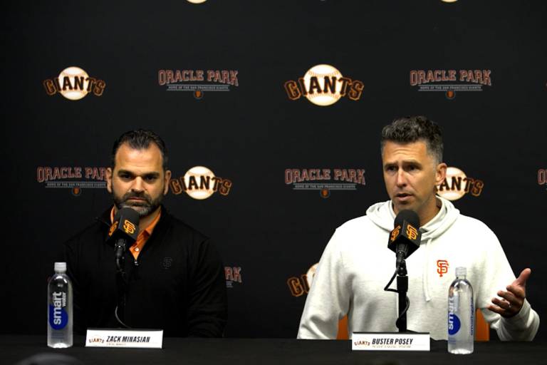 Javier López y Curt Casali regresan a los Gigantes para unirse a la directiva de Buster Posey