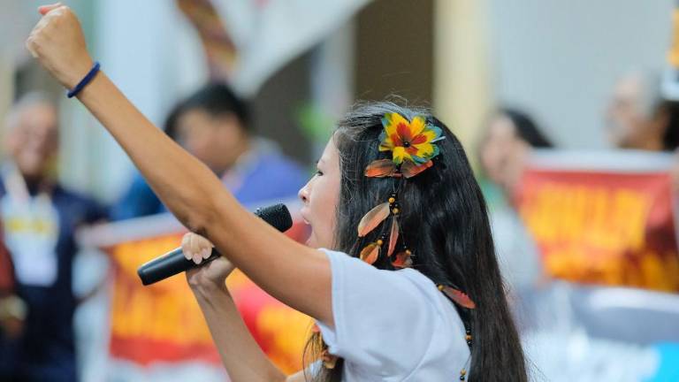 Manifestantes protestan durante la acción “Fin del Mercado Mundial” en la COP30 en Belém, Brasil.