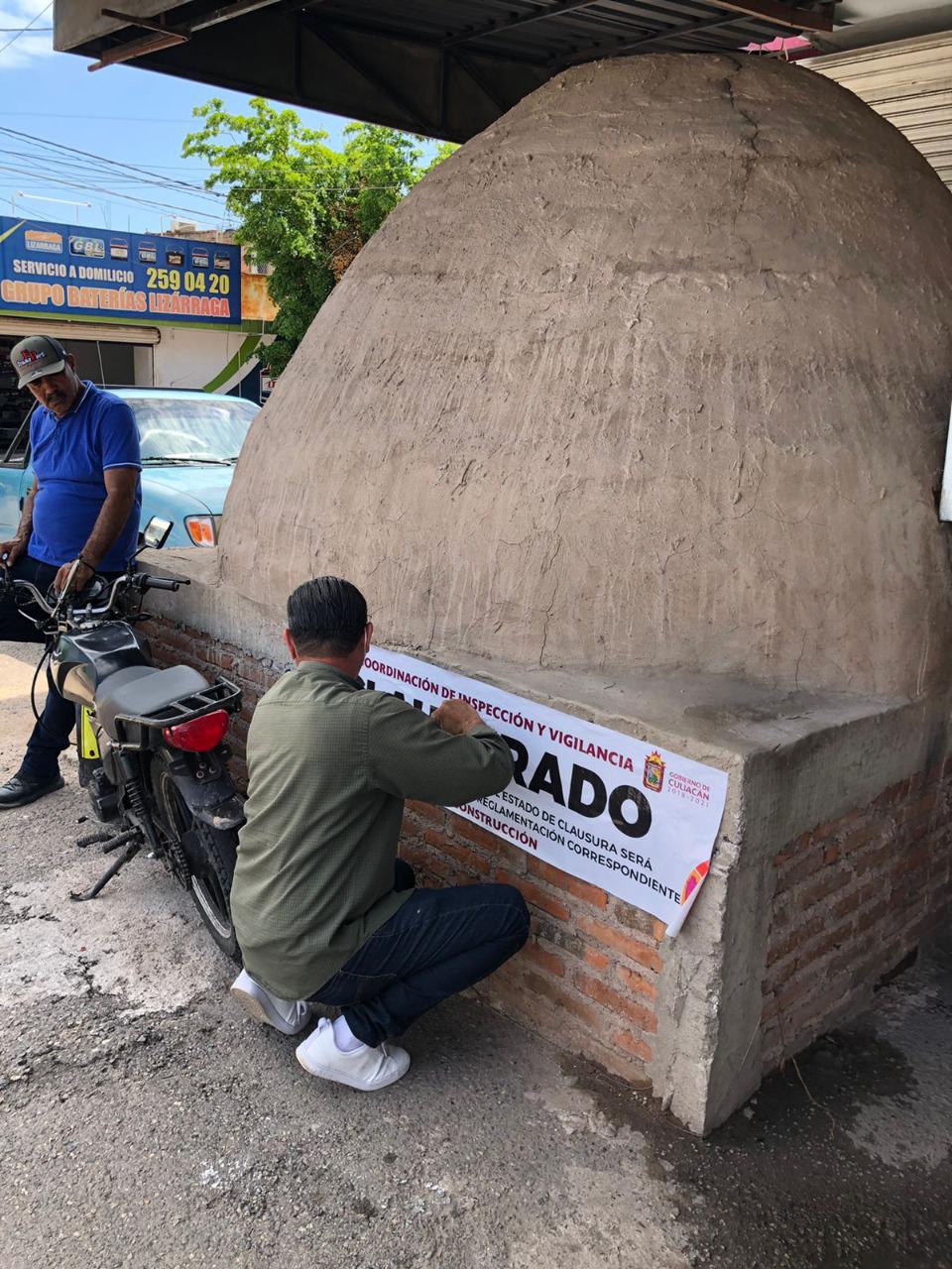 $!Comercio construye horno en la banqueta, Gobierno de Culiacán lo derrumba